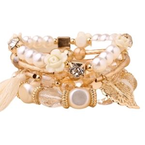 PEARL AND GOLD FOUR PIECE BRACELET SET
